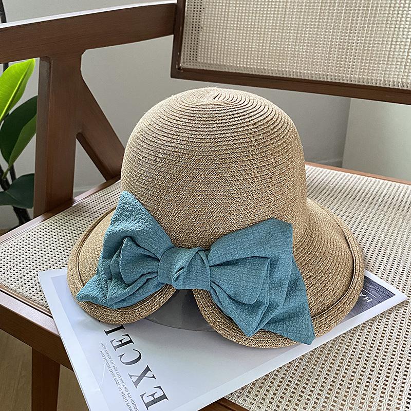 Elegant ribbon bow pearl grass hat women's summer dome seaside outing shading versatile top hat tide