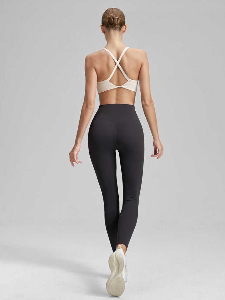 Women's Cross-Back Sports Bra: Sexy, Stylish Design for Pilates, Fitness, and Yoga, with Fixed Cups and Thin Straps for Outdoor Wear.