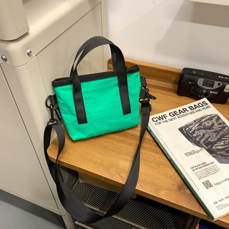 Crossbody bag women's small bag 2025 new foreign style personalized solid color portable simple shoulder bag trendy casual bucket bag