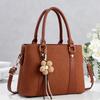 Simple commuting classic flower tassel decorative handbag new gentle temperament crossbody shoulder