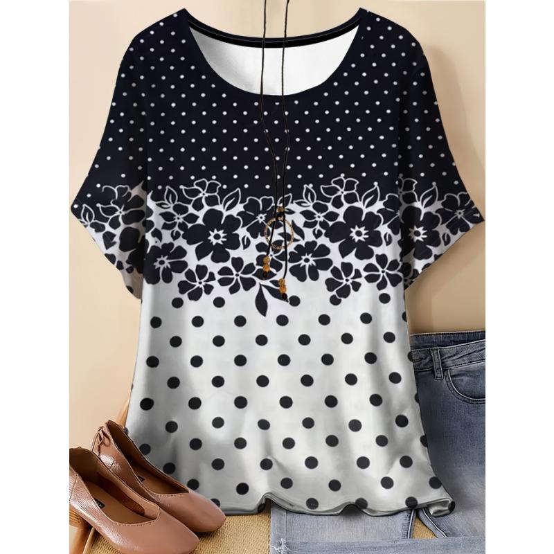 Large women s black and white polka dot printed T-shirt S