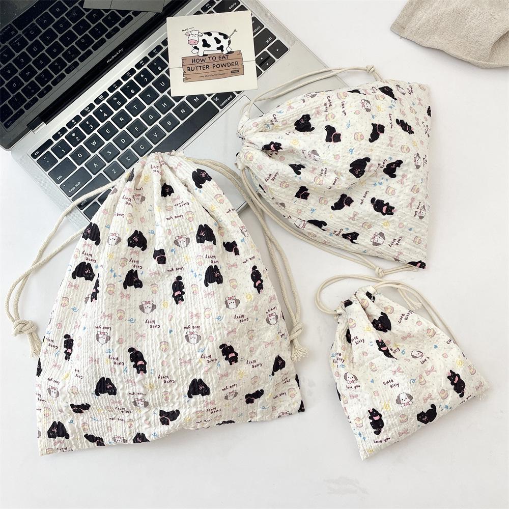 Embossed Cartoon Drawstring Bag - Dustproof Portable Cloth Organizer for Cosmetics