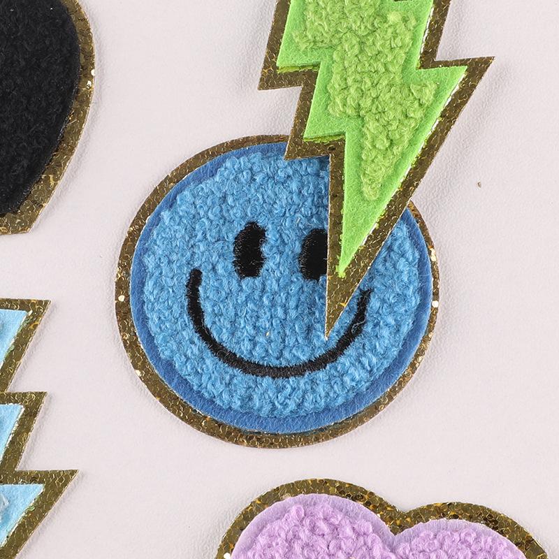 Embroidery label towel embroidery Phnom Penh Chenier smiley face badge lightning accessories cloth label patch embroidery cloth sticker