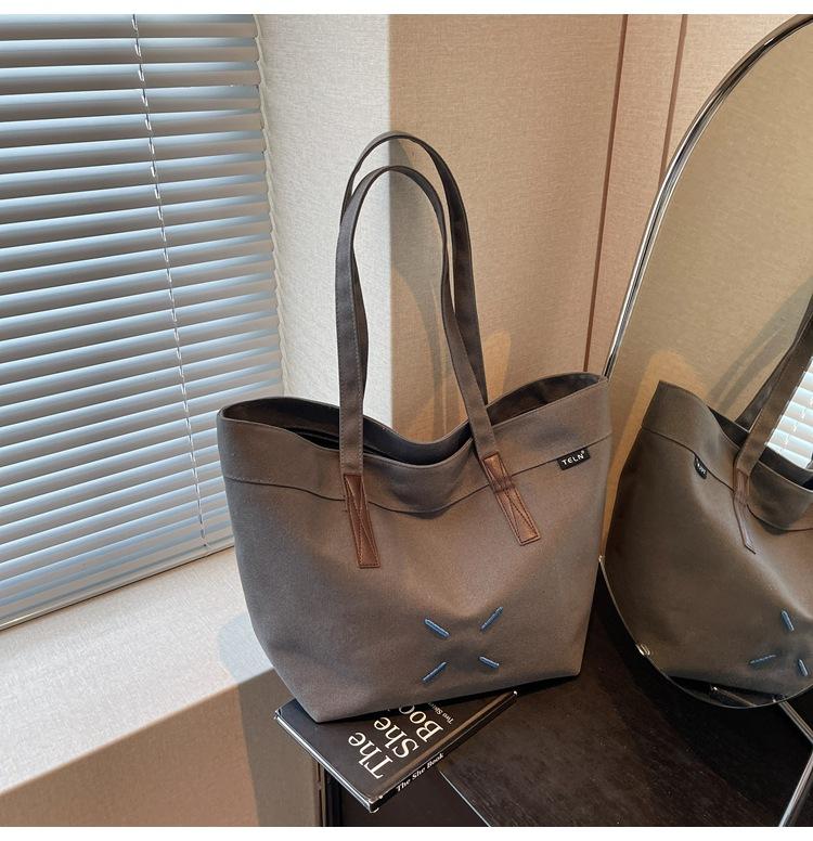 Canvas-Tasche Damen große Kapazität neu Sommer vielseitig schlichte Umhängetasche Studentin Tragetasche