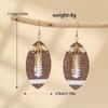 European-American Super Bowl Sporty PU Leather Football Earrings with Alloy Bowknot