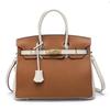 2021 Spring new trendy leather handbag top layer cowhide capacity one-shoulder crossbody hand-carried platinum bag
