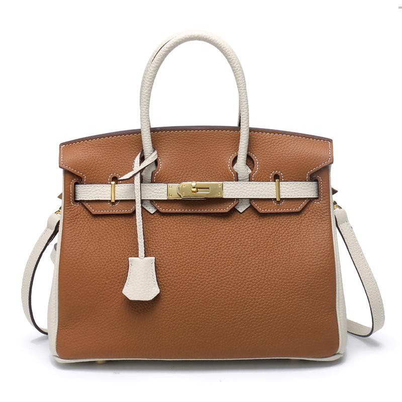 2021 Spring new trendy leather handbag top layer cowhide capacity one-shoulder crossbody hand-carried platinum bag