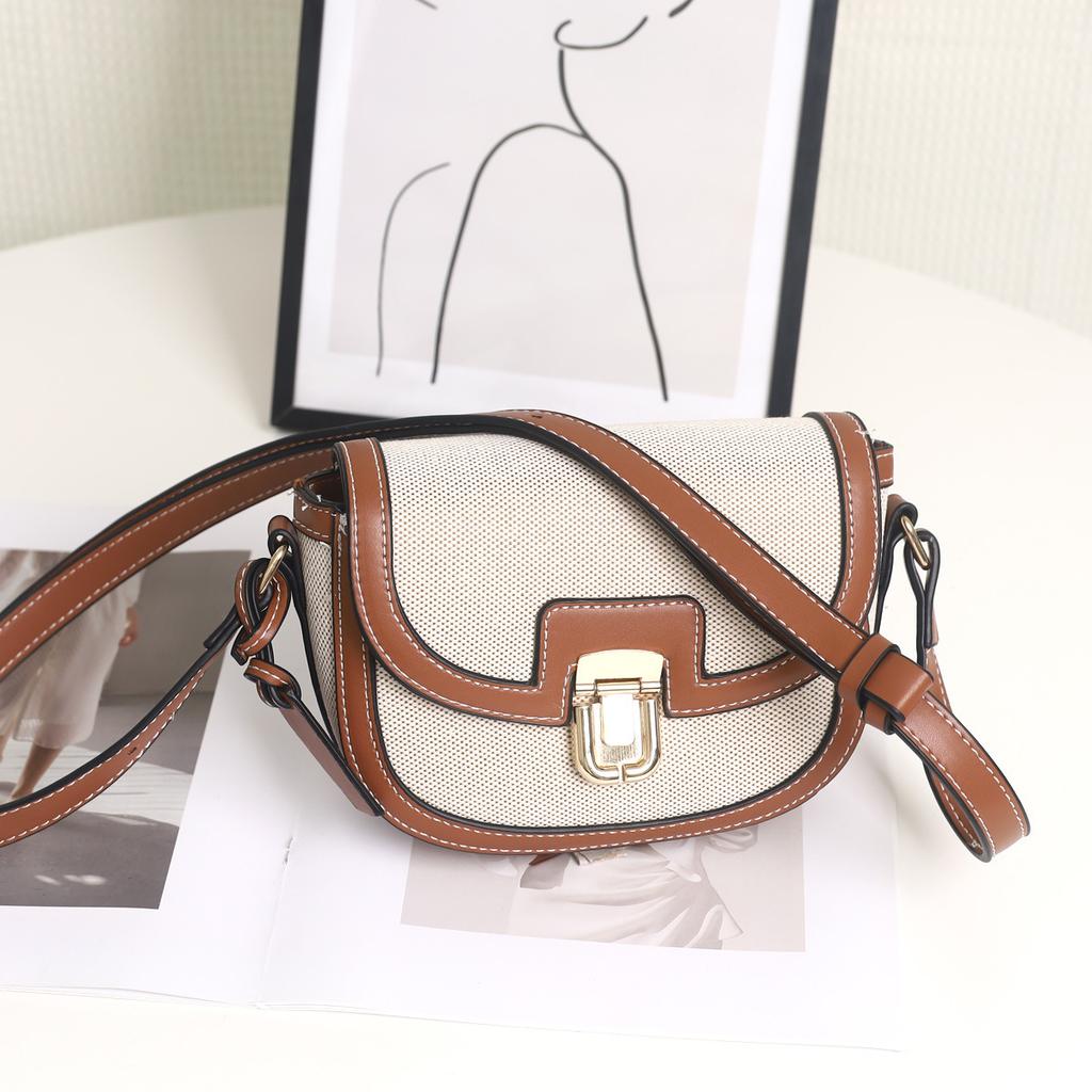 2025 autumn new ins niche woven contrasting color single shoulder diagonal span saddle bag, retro versatile underarm small bag for women