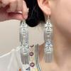 Niche double-layer Miao silver earrings, retro fringed personalized long earrings, women's middle earrings.