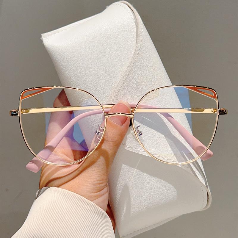 

High quality cat eye hollow metal eyeglass frame fashion simple anti blue light glasses for women Computer goggles flat lens