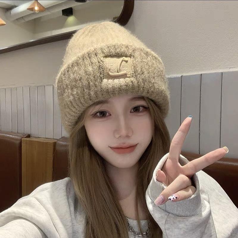 Plush Warm Knitted Beanie with Ear Flaps, Slouchy Design, Face-Slimming Knit Hat for Women with Larger Head Circumference.