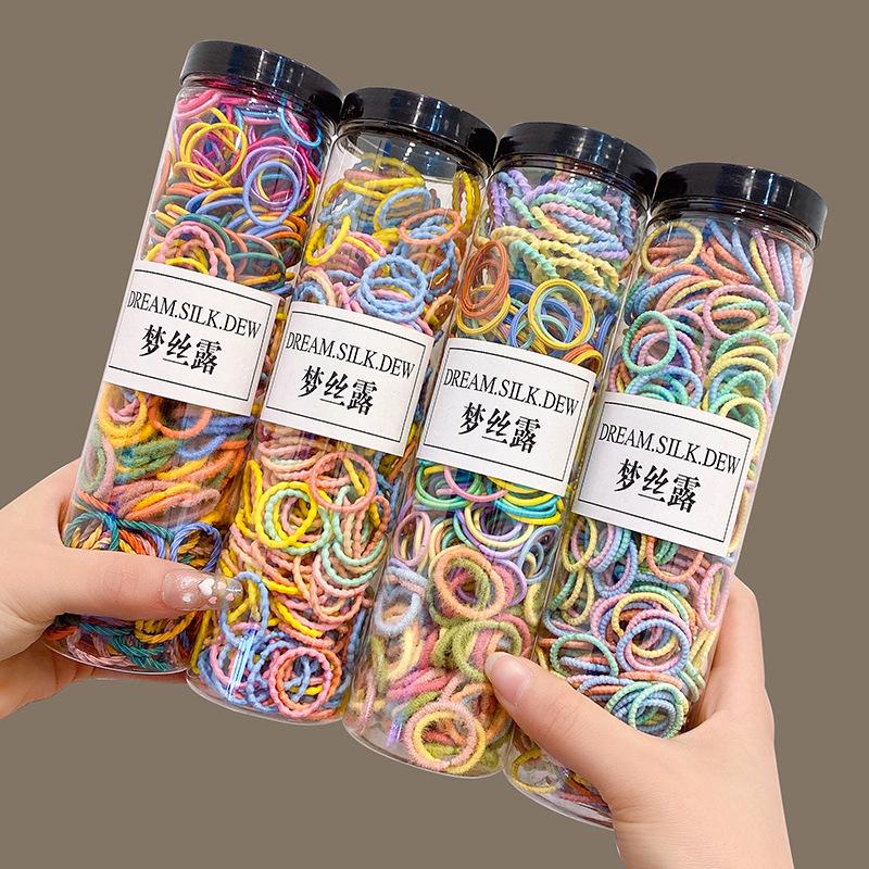 Schonende elastische Haargummis: Perfekt für Baby-Zöpfe und Bonbonfarbene Styles für kleine Mädchen.