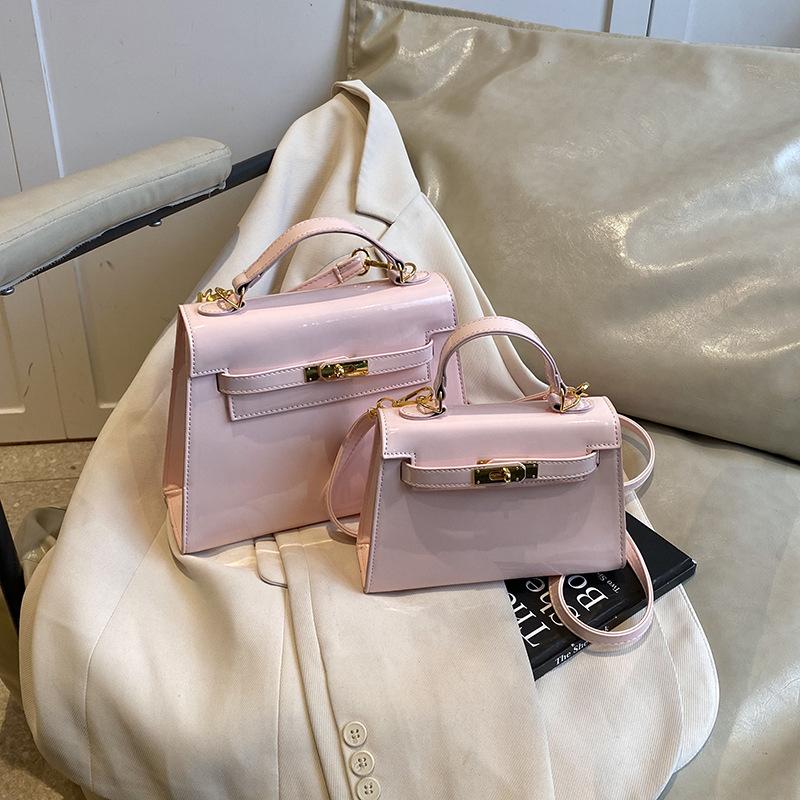 

Взрыв популярности интернет-знаменитости сумка Kelly новая женская сумка легкая роскошь супер популярная сумка-тоут модная универсальная на плечо кроссбоди сумка Small (20 * 6 * 14) розовый