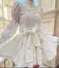 Court style dress Australian trendy brand spring and summer stand-up collar lantern sleeve embroidered lace-up white lace skirt short skirt
