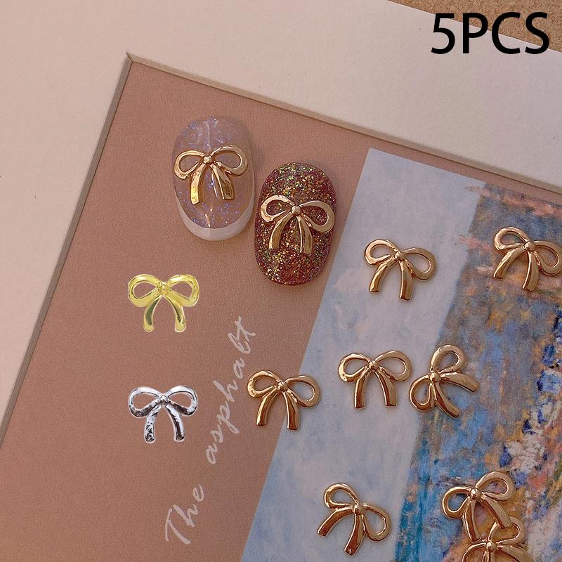 5 Stuks/Zak Elegante Legering Strik Nagel Charms 3D Metaal Zilver Goud Champagne Goud Licht Luxe Holle Strik Super Fee Nagellak Accessoire