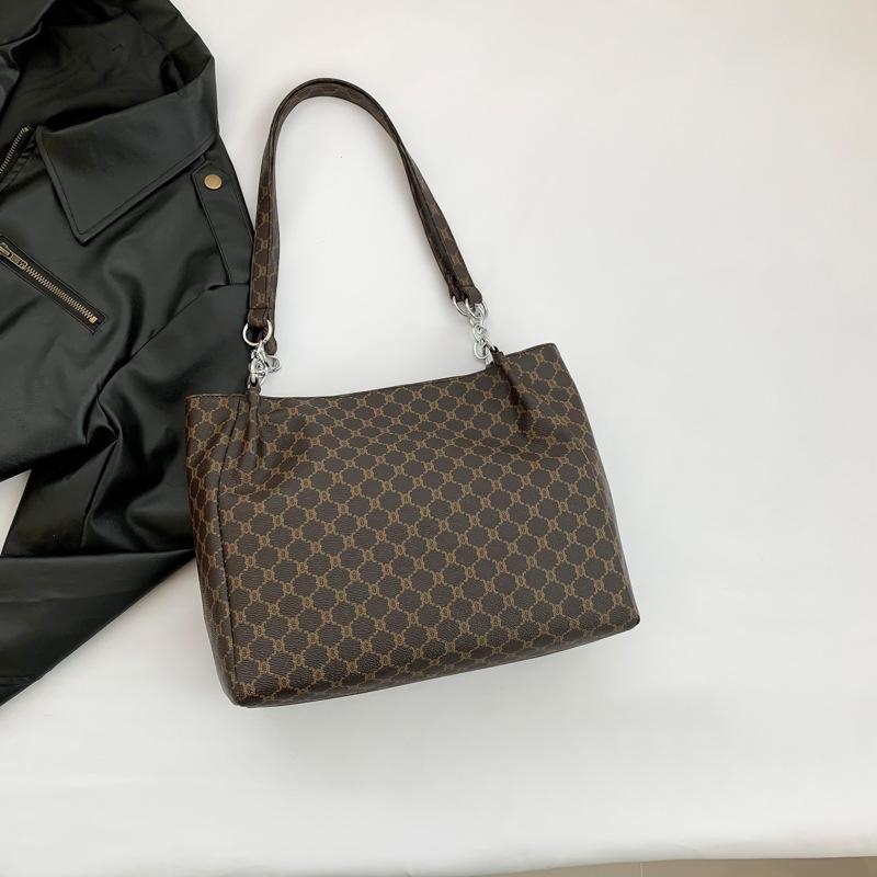 

Temperament commuting Korean version retro handbag 2025 spring and summer new versatile ins shoulder underarm bag tote bag women