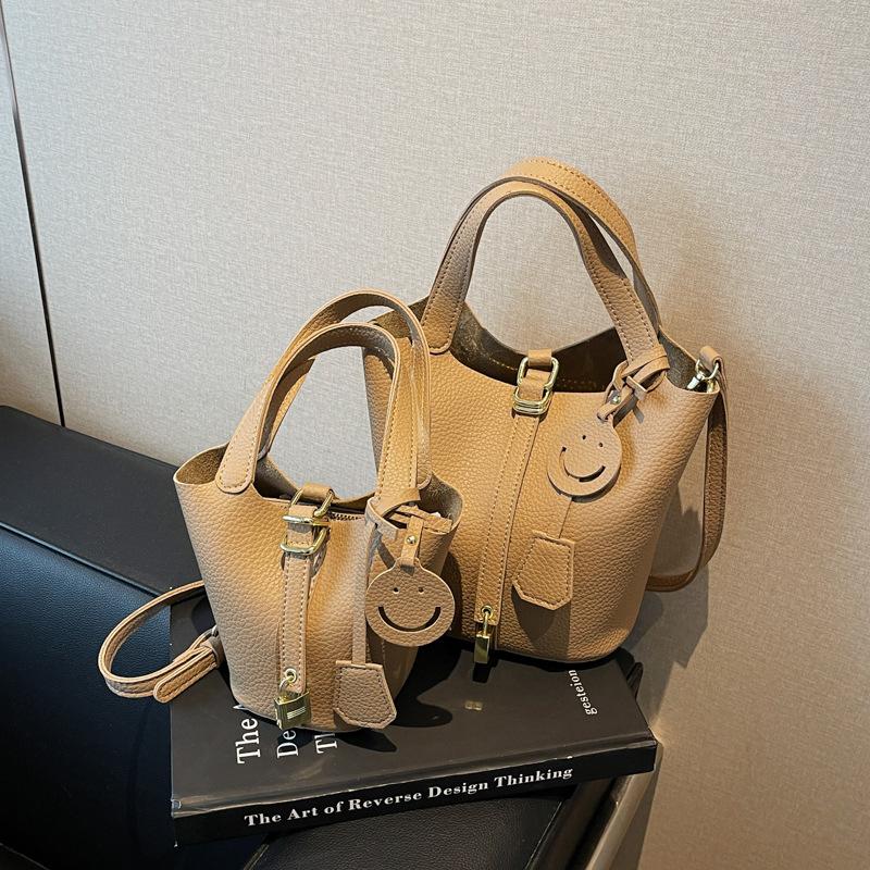 Grønnsakskurvveske dame 2025 ny retro tote dameveske nisje personlighet PU skulder bærbar bøtteveske