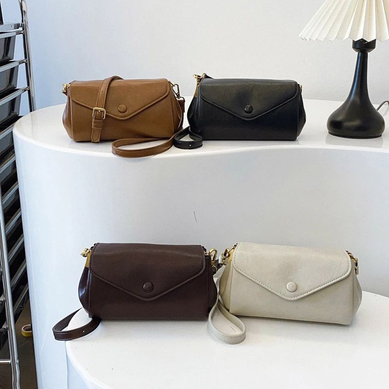 Vintage 2025 new shoulder bag temperament versatile casual simple commuting soft leather organ bag women's messenger bag