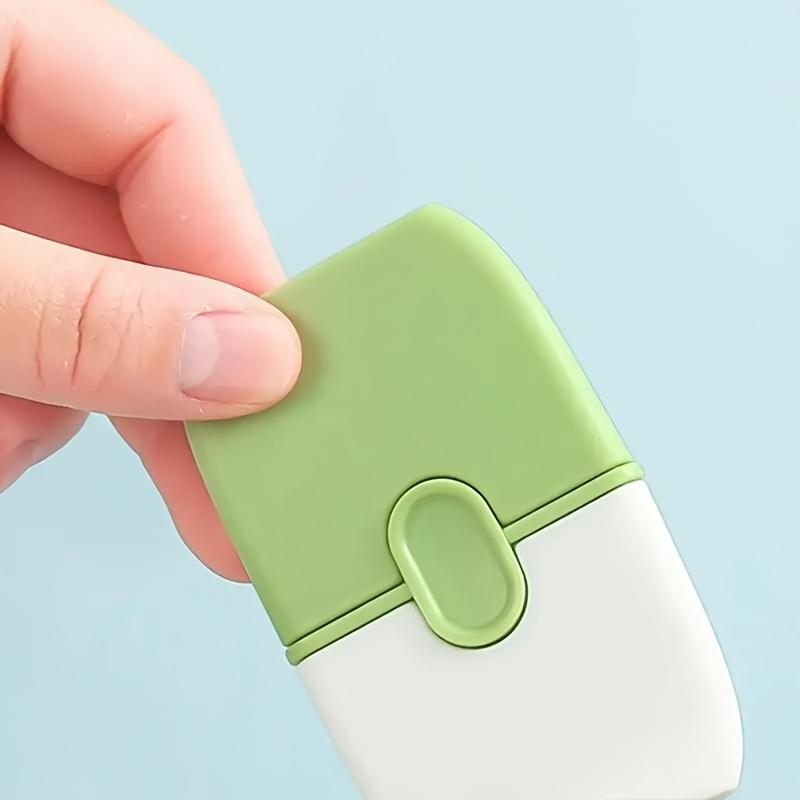 A Mini Scraper with A Protective Cover, A Portable Dual-Headed Ceramic Wall Cleaner, A Tile Scraper, and A Multifunctional Cleaning Tool.