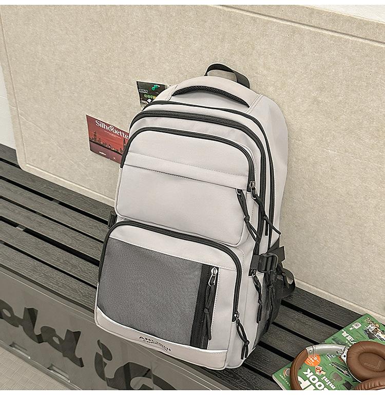 School bag 2025 new Korean version solid color couple backpack large capacity multi-compartment school bag casual simple versatile backpack
