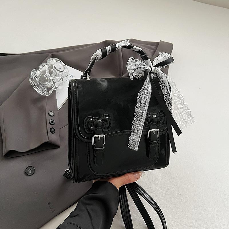 

Summer 2025 New Lid Square Bag Lace Bow One Shoulder Slant Back Women s Bag Fashion Women s Backpack чорний