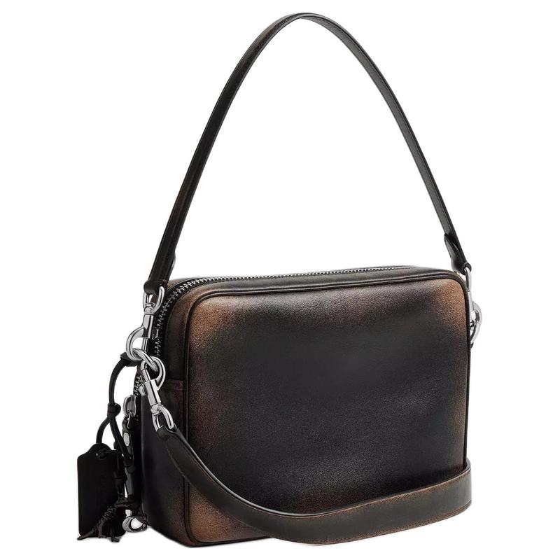 Coach Borsa a tracolla DAKOTACrossbody 24 chiusura a cerniera retrò tracolla staccabile design compatto ciondolo dinosauro pelle di mucca taglia media da uomo