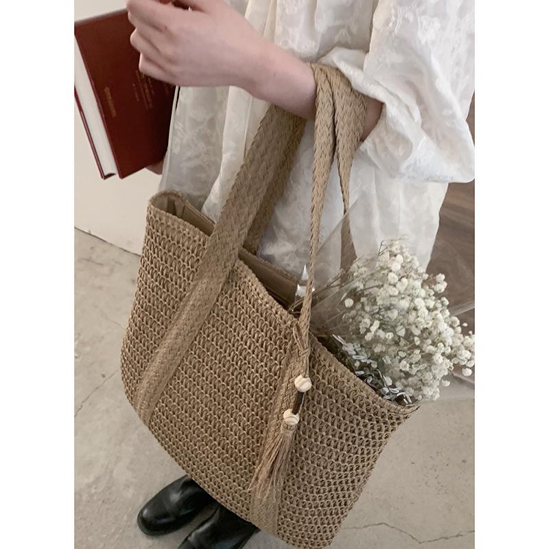 Сумка женская высококлассная изысканная сумка подмышку 2025 весна новая большая вместимость соломенная сумка на плечо сумка-тоут