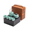 Portable Ceramic Kung Fu Tea Set: Teapot with Handle and Four Cups for Travel and Business Gifting