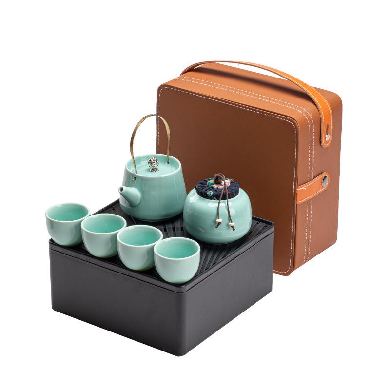 Portable Ceramic Kung Fu Tea Set: Teapot with Handle and Four Cups for Travel and Business Gifting