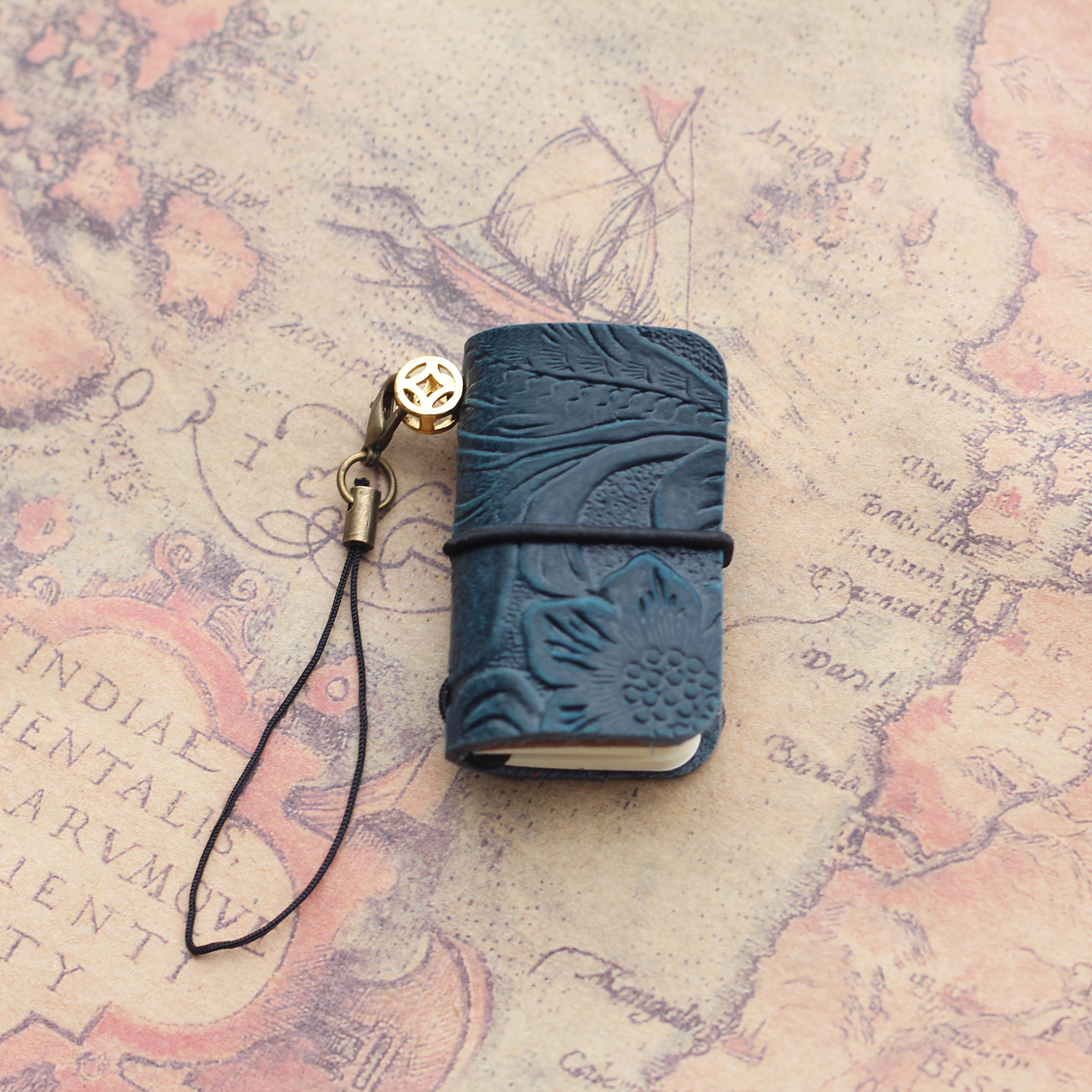 

A Mini Genuine Leather Notebook with a Vintage Cover, Perfect for Travelers, Featuring 64 Pages