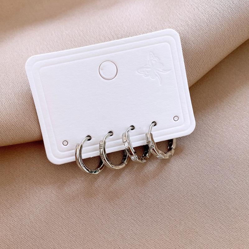 Plain circle zircon smooth surface circle ear buckle two-piece set simple cold wind earrings niche commuting versatile earrings