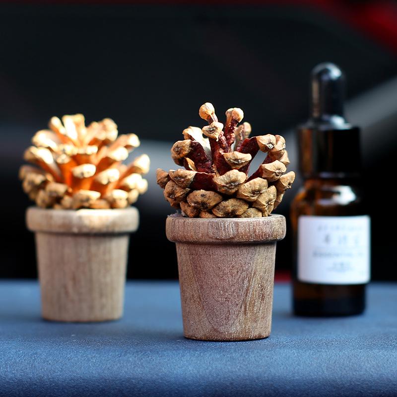 Creative Pine Cone Portable Aroma Diffuser: Wooden Essential Oil Air Freshener Ornament for Home and Car.