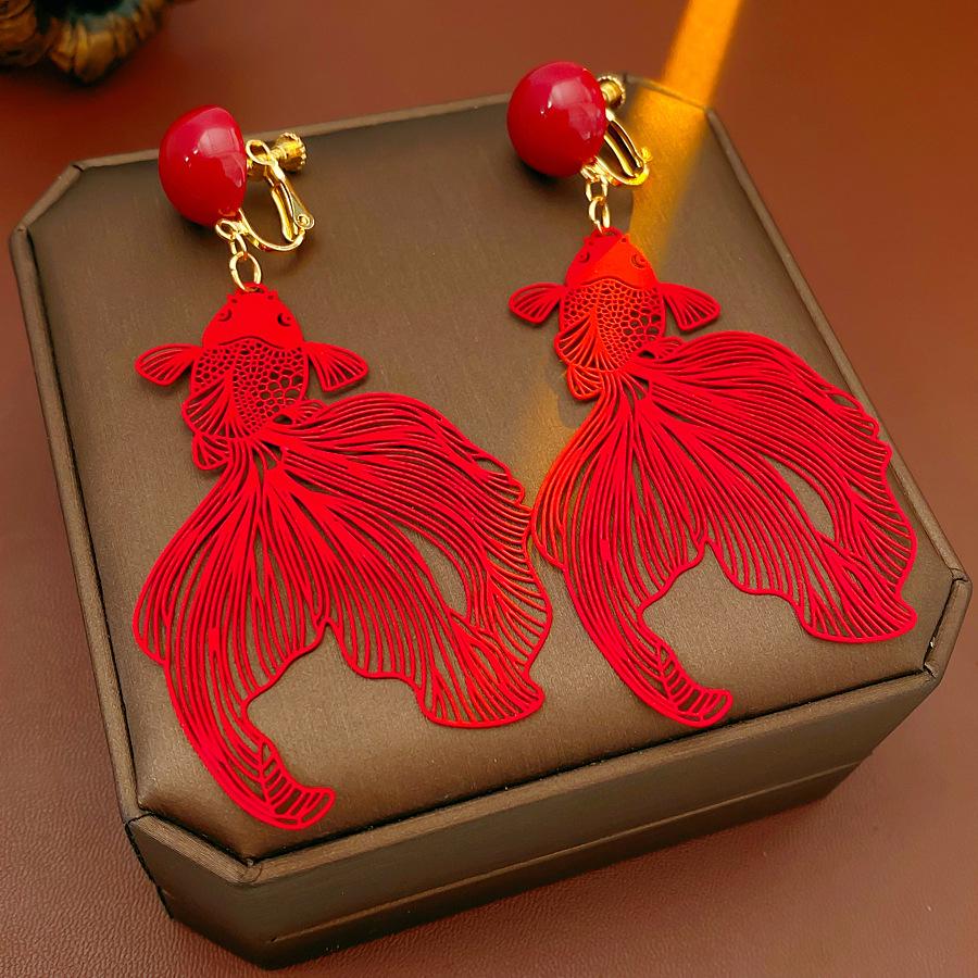 Retro Goldfish Hollow Ball Ear Clips - Luxurious Niche Design Earrings, No Piercing Needed.
