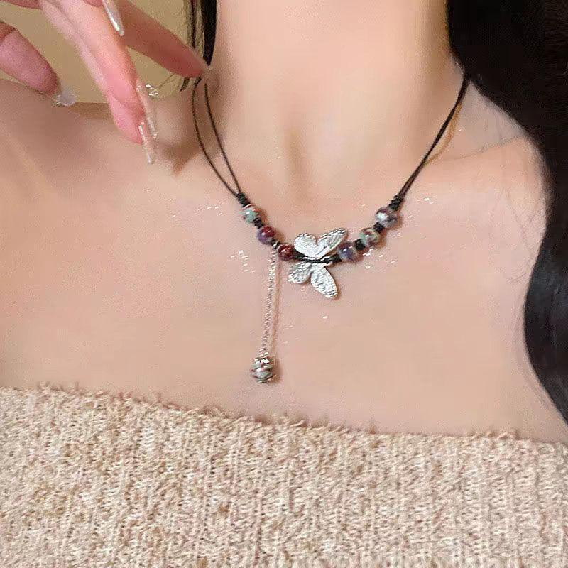 Ceramic butterfly rose woven necklace women's new retro accessories can be drawn long graduation gift