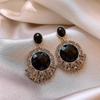 Elegant Gold-Plated Black Zircon Stud Earrings - Niche Design for a Luxurious Fashion Statement