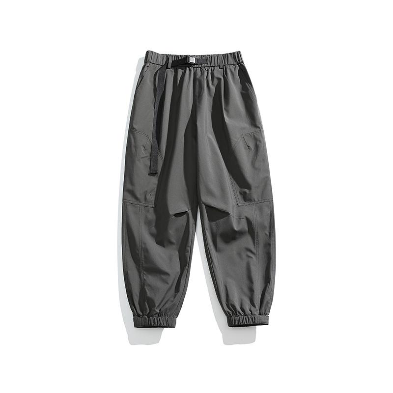 Jarní novinka Outdoor Soft Shell Three Anti-Assault Kalhoty Overaly Funkční kalhoty Trend Sport Volné trsy nohou Běžné kalhoty