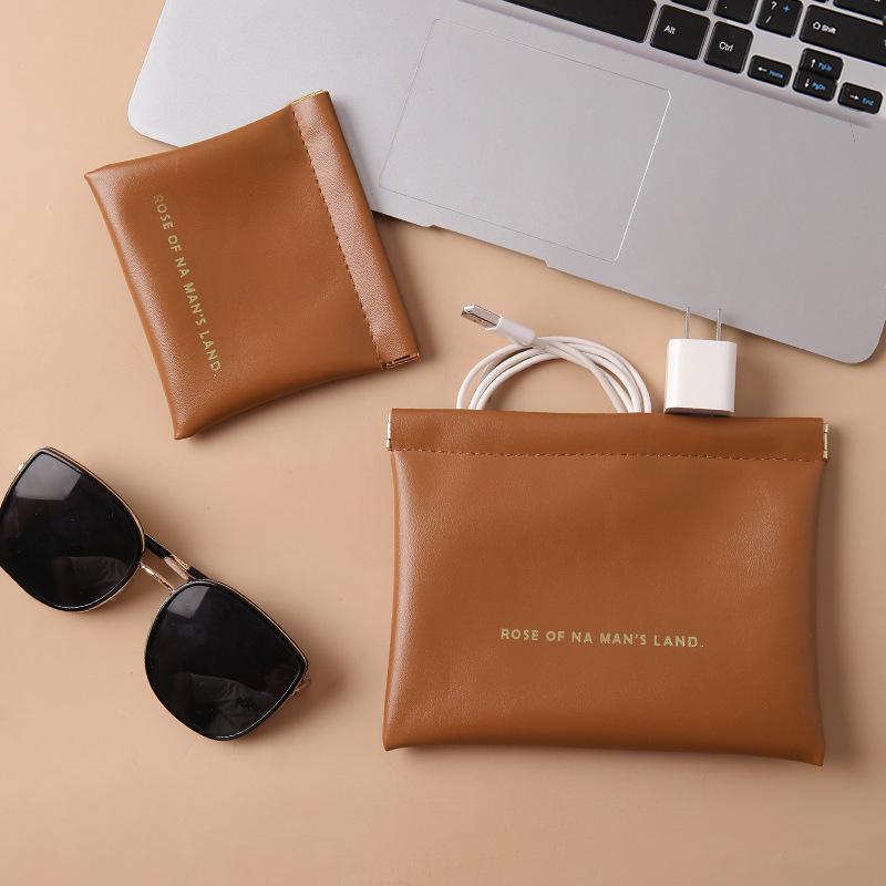 Portable Earphones, Charger, and Coin Storage Pouch with Auto Closure