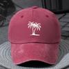A Unisex Lightweight Fashionable Baseball Cap with a Coconut Tree Print Suitable for Boys and Girls in a Vintage Washed Style