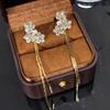 Wear two flowers, light luxury, long fringed temperament stud earrings, high-end explosive 1011 new women's niche earrings