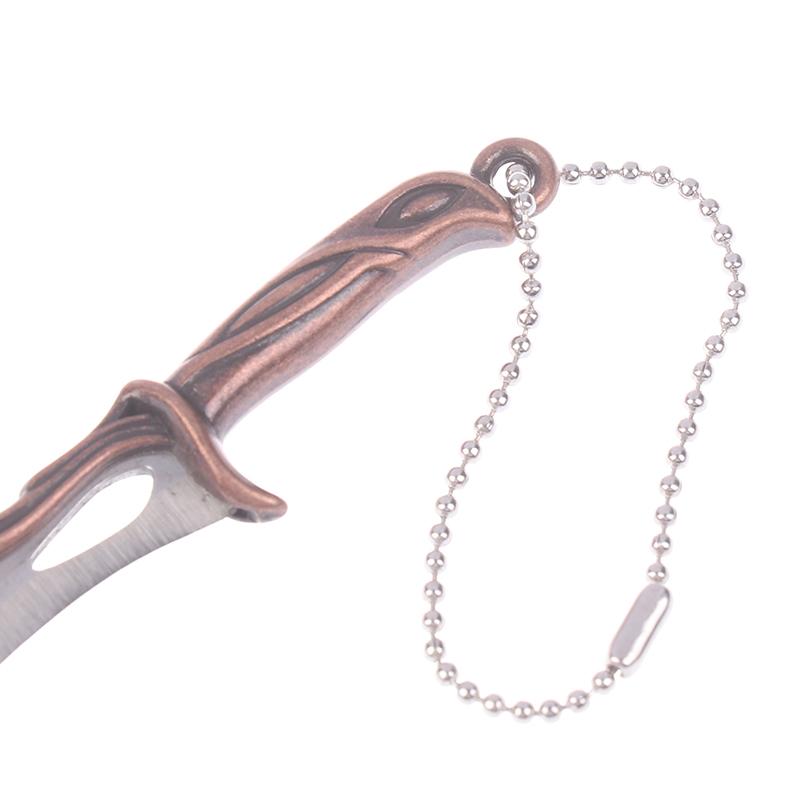 Брелок портативный мини-нож подходит для открытия праздничных подарков — фото 5