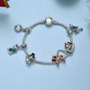 Christmas Bracelet With Snowflake Bells And Santa Charm For Holiday Gift Giving
