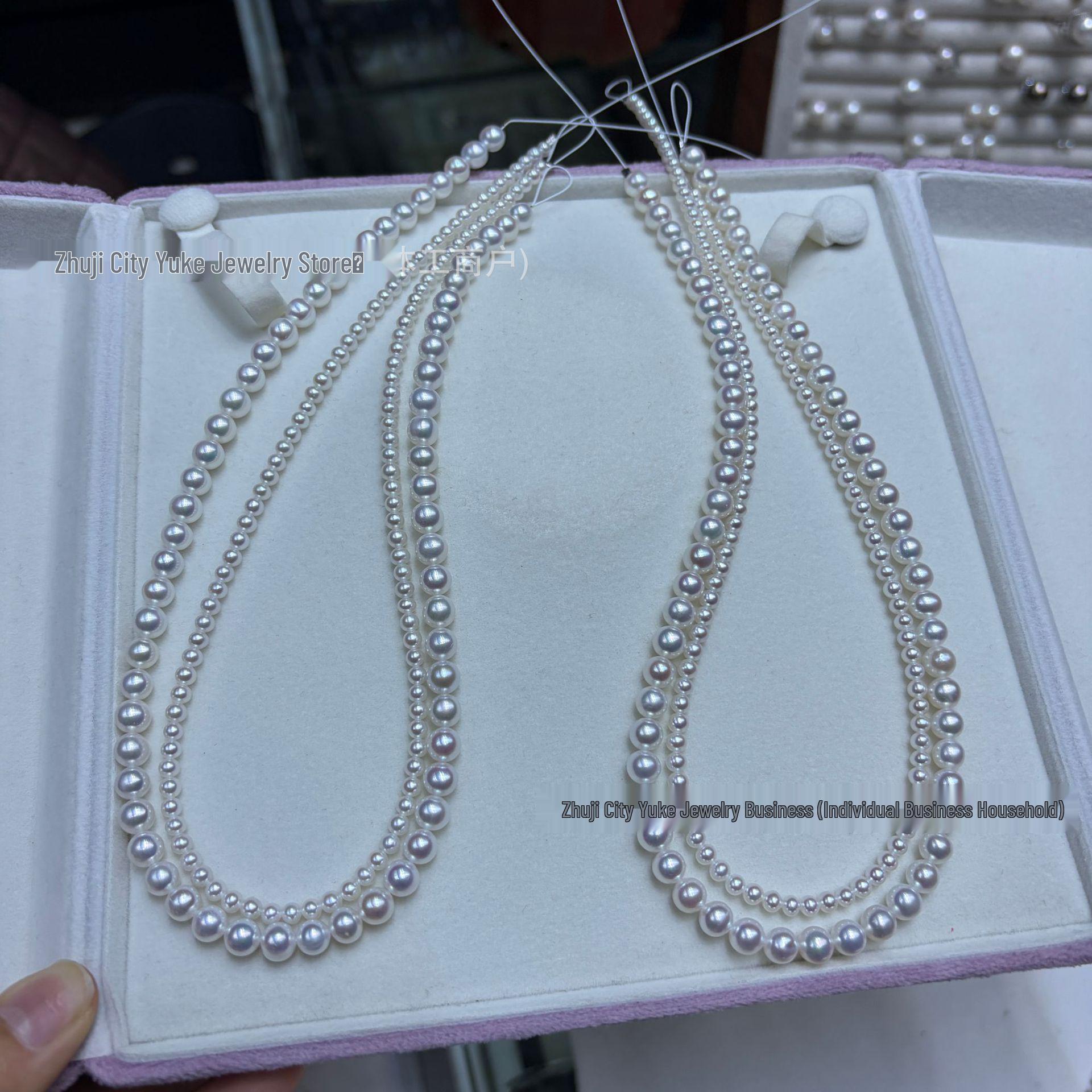 

Натуральное пресноводное жемчужное белое двухрядное ожерелье с почти круглыми жемчужинами 3-4/6-7 мм и застежкой-восьмеркой. 3-4mm/6-7mm белый