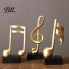 Musikalische Note Ornament Musik Skulptur Gold Harz Symbol Figurine Modernes Geschenk für Liebende Tischdekoration für Klavierzimmer Home Office Tischmittelstück