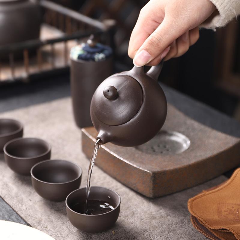 Purple sand travel kung fu tea set, one pot, four cups, portable bag, express cup, small gifts for outdoor business activities
