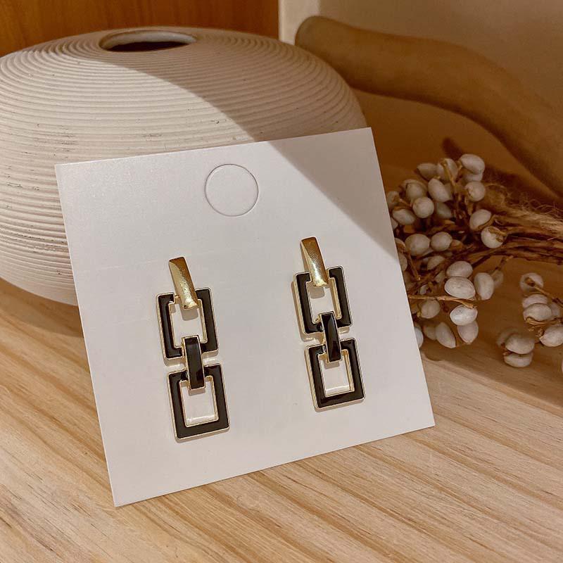 Elegant Gold-Plated Black Zircon Stud Earrings - Niche Design for a Luxurious Fashion Statement