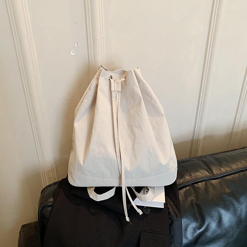 Schoolbag Korean ins Simple Couple Bag Large Capacity Bucket School Bag Nylon Backpack Drawstring Strap One Shoulder Crossbody Bag