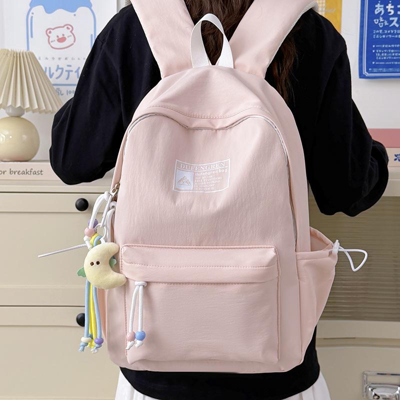 Schoolbag backpack 1011 men's and women's travel backpack men's outdoor lightweight schoolbag women's travel lightweight high-value schoolbag