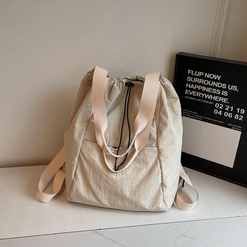 Schoolbag Fashion Drawstring Backpack Women's 1011 Spring New Simple Handheld Shoulder Bag Large Capacity Travel Backpack