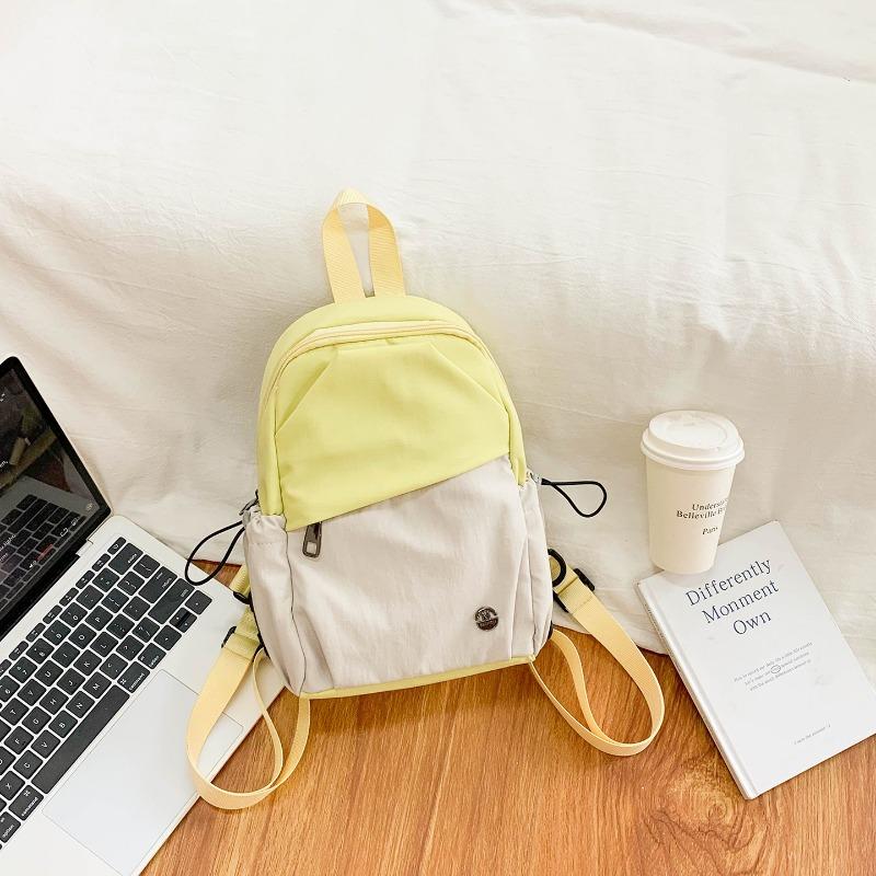 Niche design contrasting color backpack women's new lightweight fashion student bag multifunctional backpack breast bag