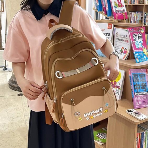 Schoolbag wholesale female cute ridge protection versatile backpack large capacity lightweight junior high school backpack new fashion primary school